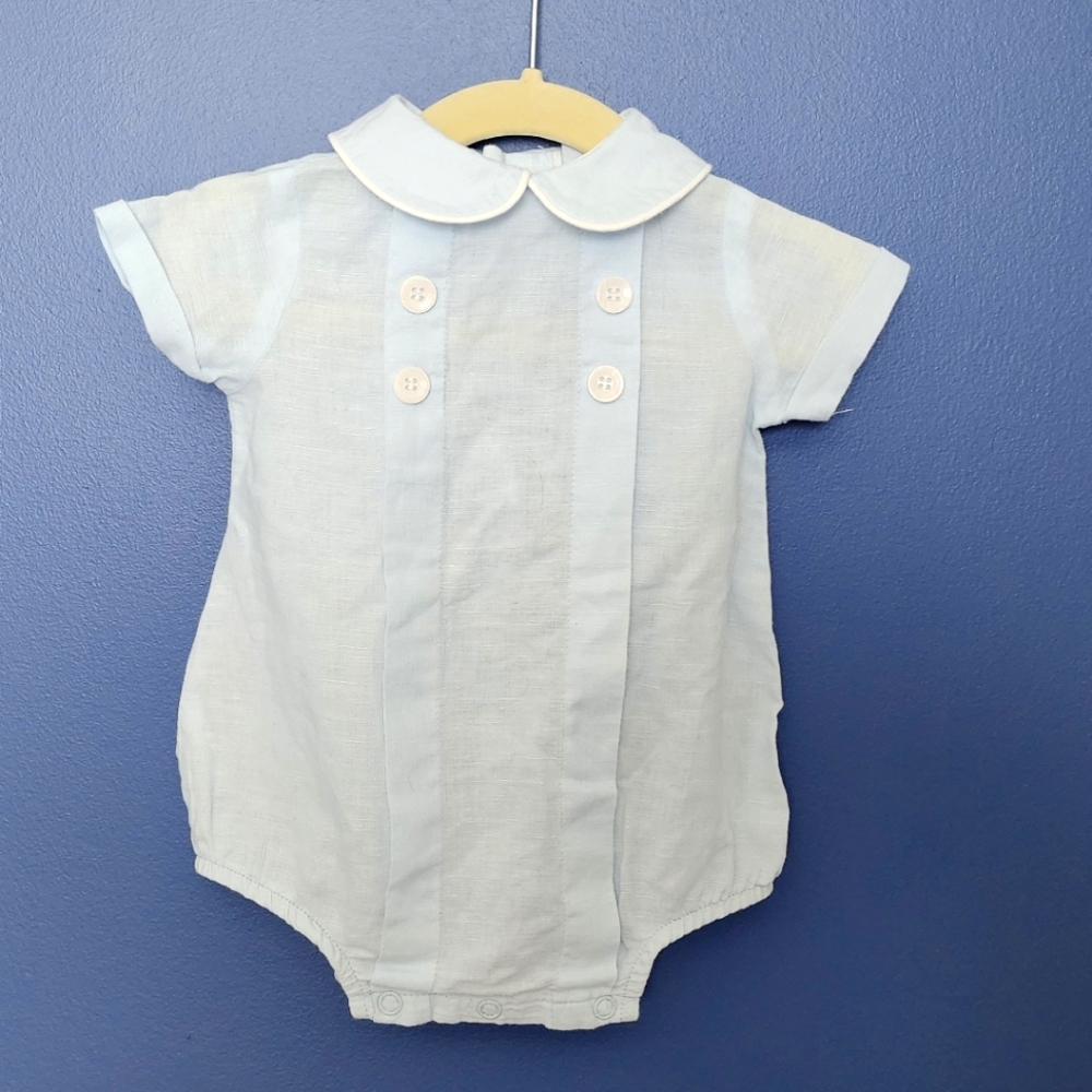 Linen blue onesie w/ cuffed sleeves and Peter Pan collar